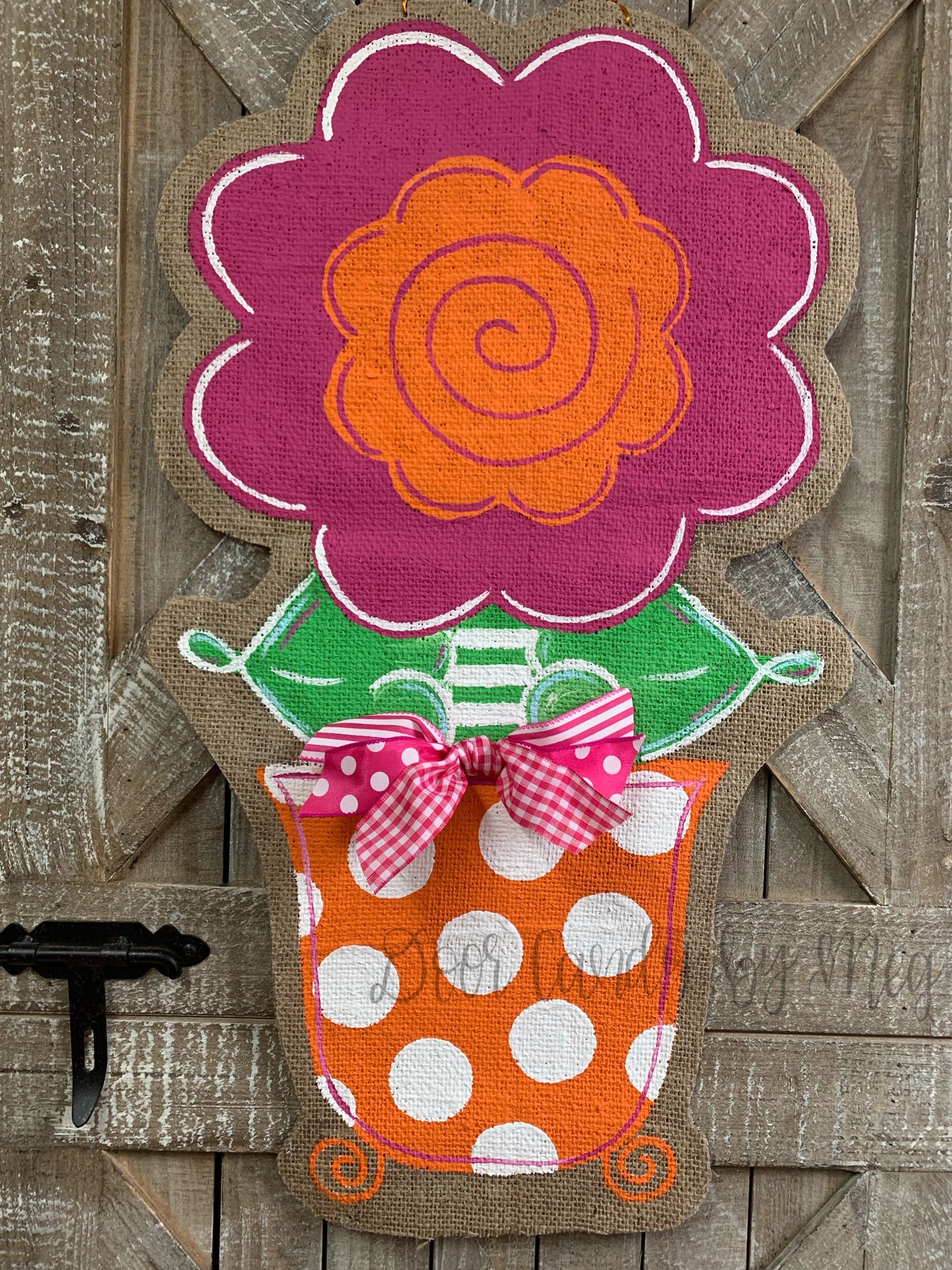 pink and orange whimsical burlap flower door hanger in orange and white polka dot flowerpot