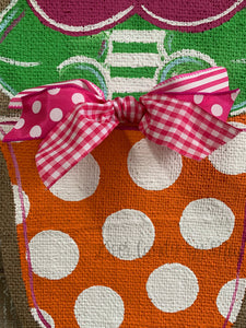 pink and orange whimsical burlap flower door hanger in orange and white polka dot flowerpot