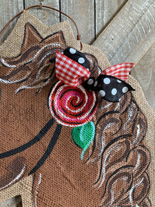 brown whimsy horse head door hanger with painted rose detail
