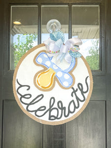 Celebrate Circle Door Hanger with Blue Pacifier Add On