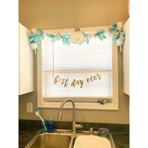 Hand Tied Snowball Garland in Turquoise
